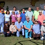 Entire dental team posing together