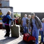 dentists holding luggage