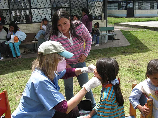 young girl receiving dental care